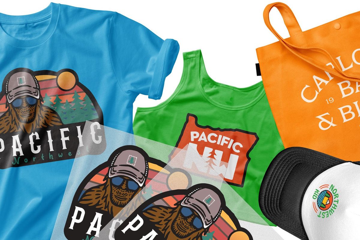 DTF transfers pressed on t-shirts, a tank top and a tote bag